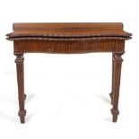 A 19TH CENTURY GEORGIAN STYLE ROSEWOOD SERPENTINE FOLD OVER CARD TABLE with fluted frieze and square