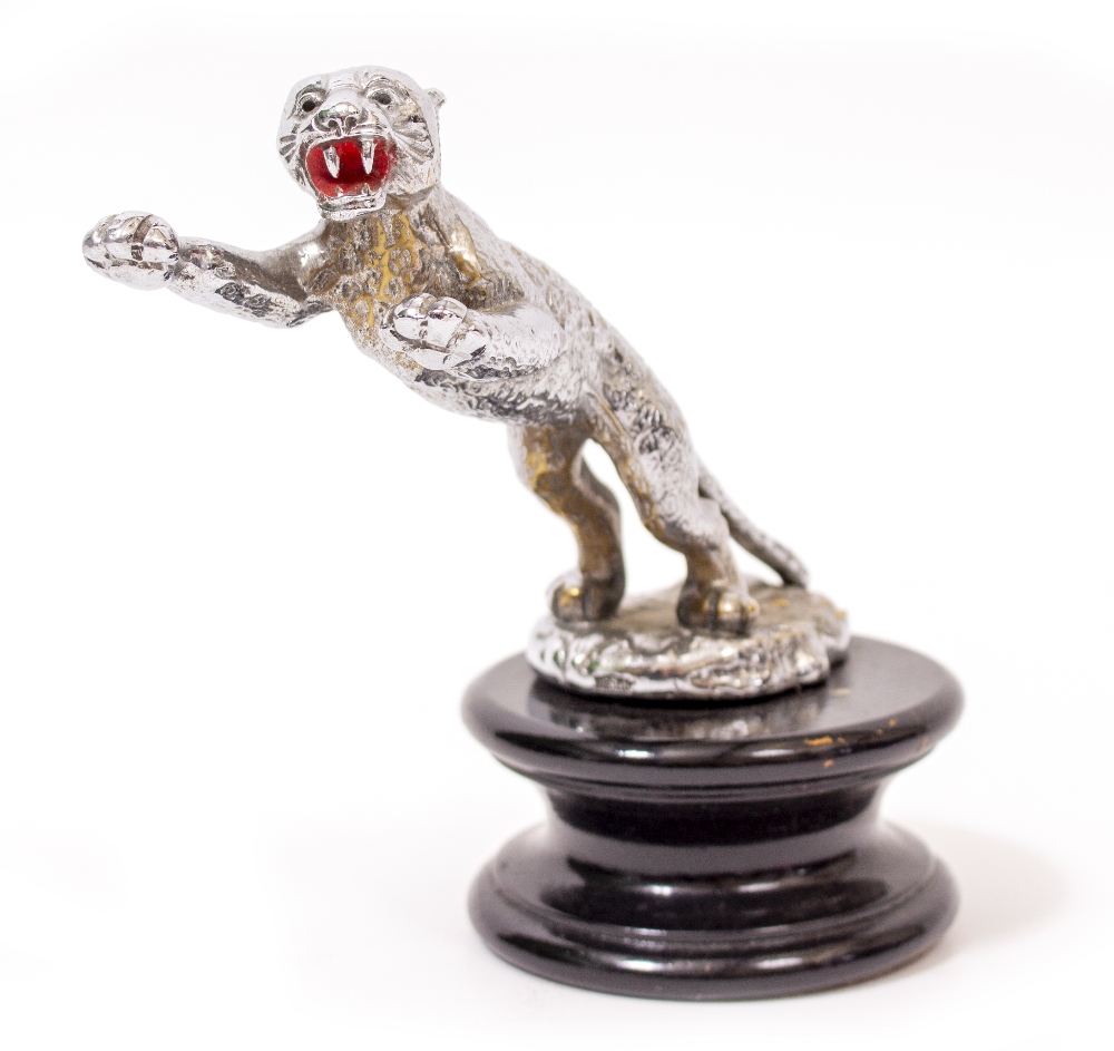 A DESMO CHROME PAINTED CAR MASCOT in the form of a leaping leopard, 18cm long, with stamped mark and