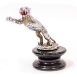 A DESMO CHROME PAINTED CAR MASCOT in the form of a leaping leopard, 18cm long, with stamped mark and