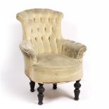 AN EARLY 20TH CENTURY BUTTON UPHOLSTERED ARMCHAIR with turned supports, 75cm wide x 77cm deep x 94cm
