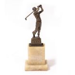 A BRONZE FIGURE OF A GOLFER on stepped alabaster plinth base, 27.5cm high overall