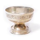 A MINIATURE SILVER RENAISSANCE STYLE CHALICE with engraved motto to the bowl and spreading base,