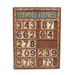 AN OAK HYMN BOARD 74cm high x 57cm wide