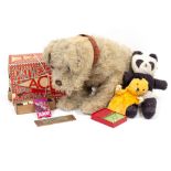 AN EARLY 20TH CENTURY STRAW STUFFED DOG a Chad Valley Sooty glove puppet, a panda, an Ace Pathescope