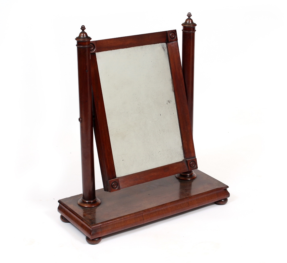 A 19TH CENTURY MAHOGANY DRESSING TABLE MIRROR the rectangular mirror plate on turned supports and