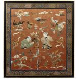 Silk and embroidered panel Chinese the centre having two young boys playing amongst various bats,