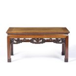 Hardwood low table Chinese, 19th Century carved with a fret work undertier, with a Chinese character