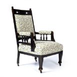 In the Manner of Edward William Godwin (1833-1886) Arts & Crafts armchair ebonised with heart