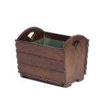 Stanley W. Davis Stained wood log bin plank sides, fan cutouts, studded details 41cm across