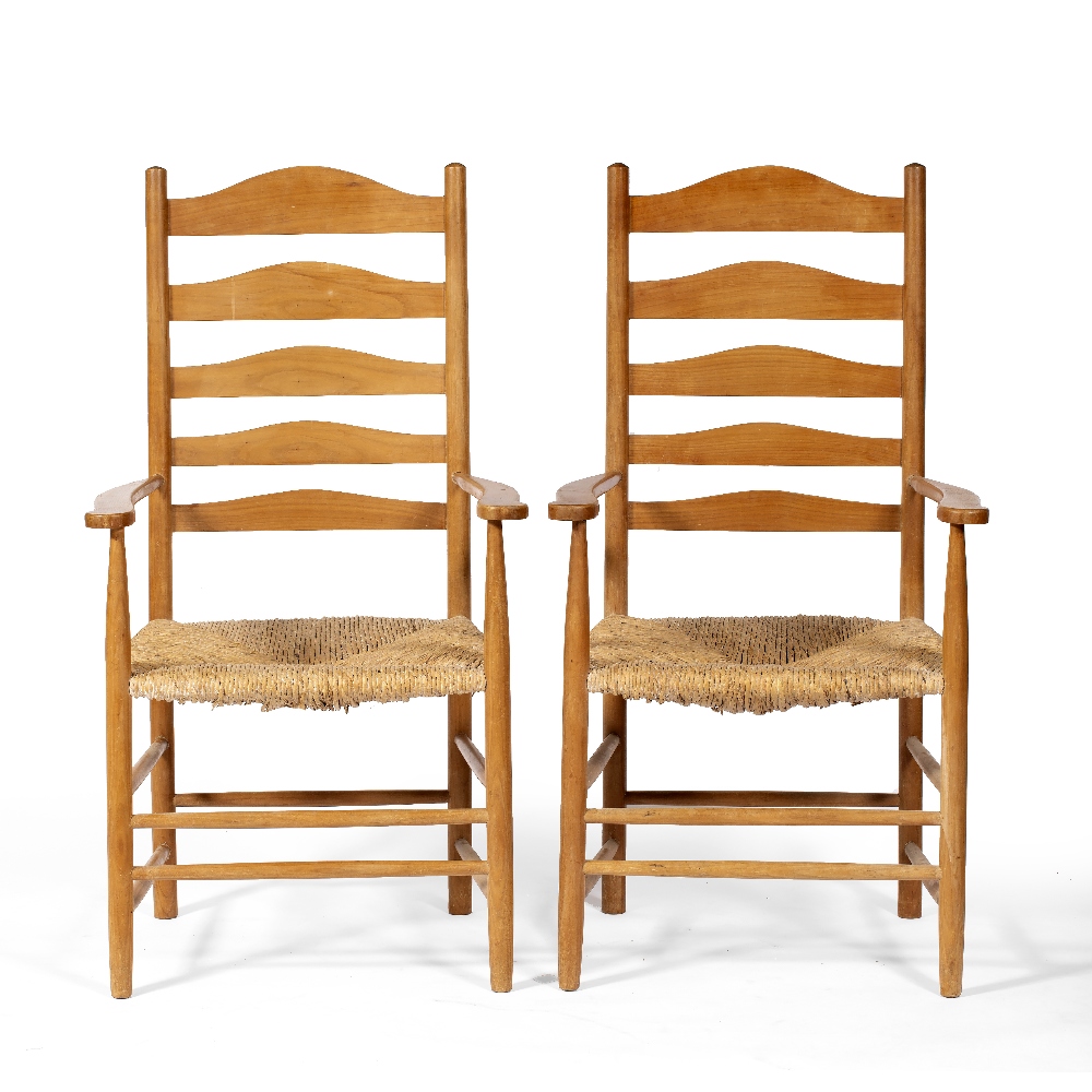 Cotswold School Pair of ash armchairs ladder-back, rush seats and turned supports and legs each