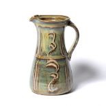 Jo Finch (b. 1947) Stoneware jug green and blue mottled glaze impressed potter's mark to underside