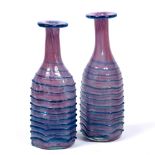 Italian school Pair of glass vases cloudy pink with raised blue details each 26cm high