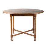Attributed to William Birch Arts & Crafts oak dining table, circa 1900 round plank top overturned