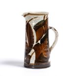 Alan Caiger-Smith for Aldermaston Pottery (b. 1930) Stoneware jug abstract hand painted brown design