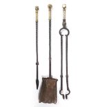 Cotswold School Set of three fire irons, circa 1910 carved linear design, twisted form, tongs