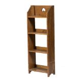In the manner of Liberty & Co Small mahogany bookshelf heart cut out, four shelves 86cm high