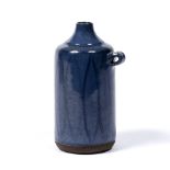 Nis Stougaard (Danish, 20th century) Small stoneware jug blue mottled glaze with hand painted linear
