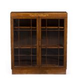 Heals Walnut glass fronted bookcase, 1930 book matching veneer, carved handles, two adjustable