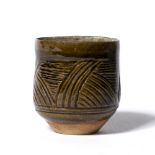 Katherine Pleydell Bouverie (1895-1985) Stoneware vase incised linear pattern under a deep green