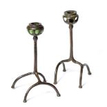 Tiffany Studios Near pair of candlesticks, circa 1900 brass, one with green Favrile glass inset