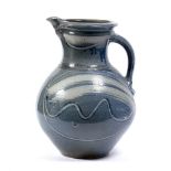 Michael Casson (British 1925-2003) A large stoneware jug blue salt glaze with linear decoration