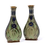 Royal Doulton pair of stoneware vases early 20th Century decorated with an Art Nouveau flower design