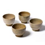 Katherine Pleydell Bouverie (1895-1985) Set of four stoneware bowls ash glazed each with impressed