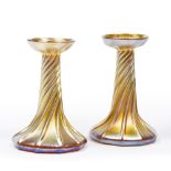 Louis Comfort Tiffany (early 20th Century) Pair of glass candlesticks golden iridescent finish,