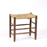 Cotswold School Oak stool, circa 1910 attributed to Edward Gardiner, rush seat, turned legs and