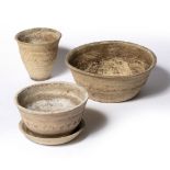 Katherine Pleydell Bouverie (1895-1985) Three pottery garden pots one with saucer, incised linear