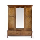 Heals Arts & Crafts Colonial mahogany wardrobe, circa 1910 made from two sections, mirrored and