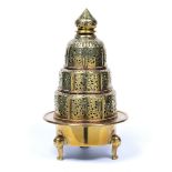 Brass incense burner Persia,early 20th Century of tiered form, with a rounded base on three feet