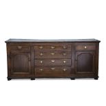 Oak dresser base George III, fitted drawers and cupboards, 208cm across x 54cm deep x 89cm high