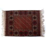 Pair of Pakistan wool rugs each with panelled designs 119cm x 156cm approx.