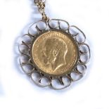1914 half sovereign in a 9ct gold pendant mount on a 9ct gold chain, 14 grams approx.