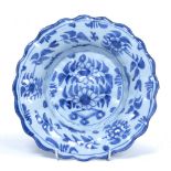 Early English delfware dish, attributed to Brislington circa 1680-1700, painted in blue with a