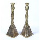 Pair of Cairo ware candle sticks Eqypt, 19th/20th Century the bases decorated with calligraphy, with