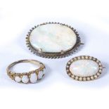 9ct gold ring with five graduated opal setting, together with two oval opal brooches