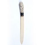 Ivory paper knife Burma, 19th century the handle decorated in open work design depicting figures