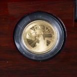 Britannia Royal Mint proof quarter ounce gold coin with related ephemera and presentation case,