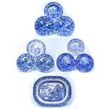 Group of blue transfer pottery including Willow Pattern oval meat dish, 46cm, wild rose, pair of
