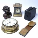 Brass lacquered ships clock, marquetry inlaid bookends, cast iron money box, clock and a camera (5)