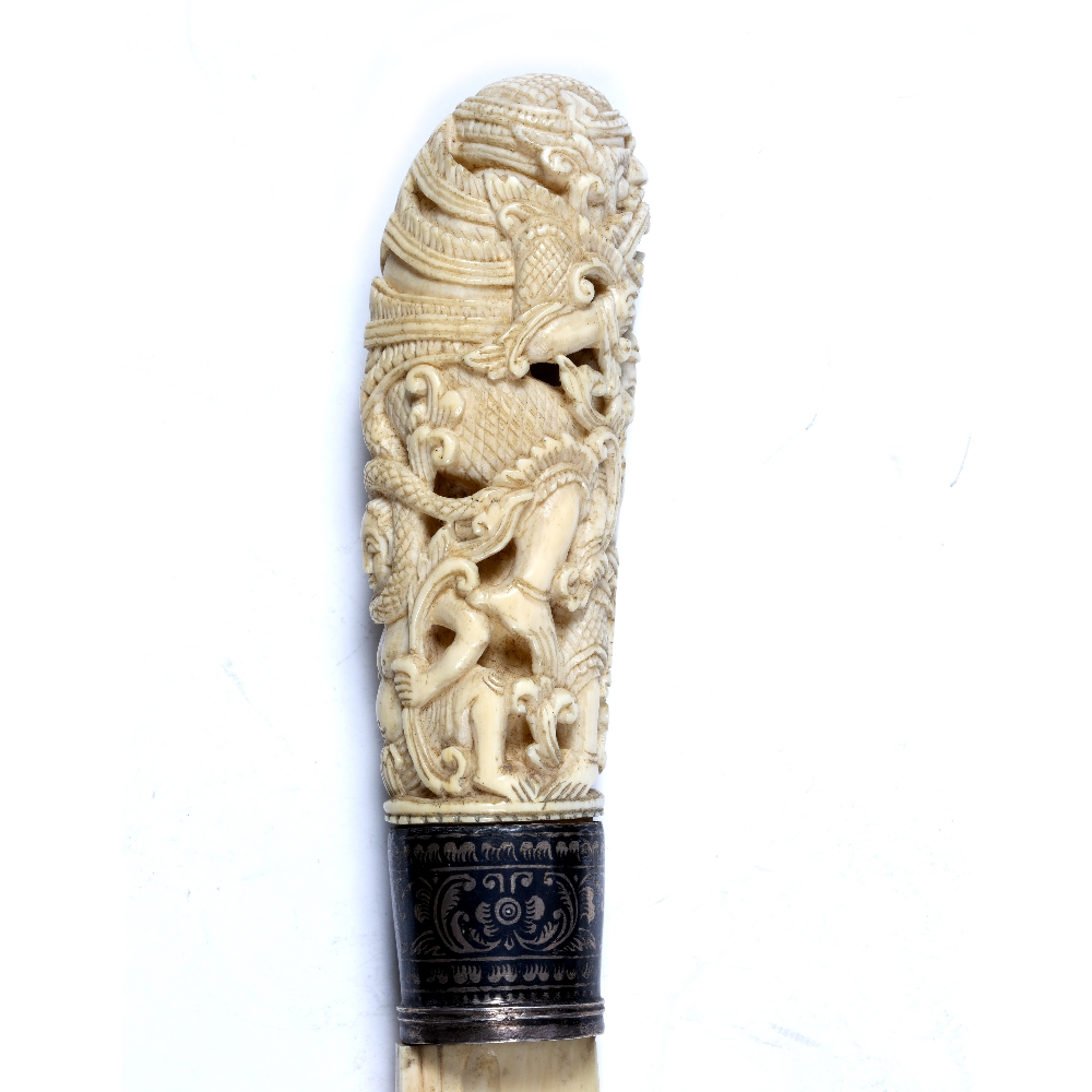 Ivory paper knife Burma, 19th century the handle decorated in open work design depicting figures - Image 3 of 4