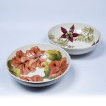 Two Moorcroft bowls one in the Columbine pattern, the other in the Hibiscus pattern both with
