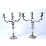 Pair of, two branch, silver on copper candelabra with relief and acanthus decoration, 52cm tall