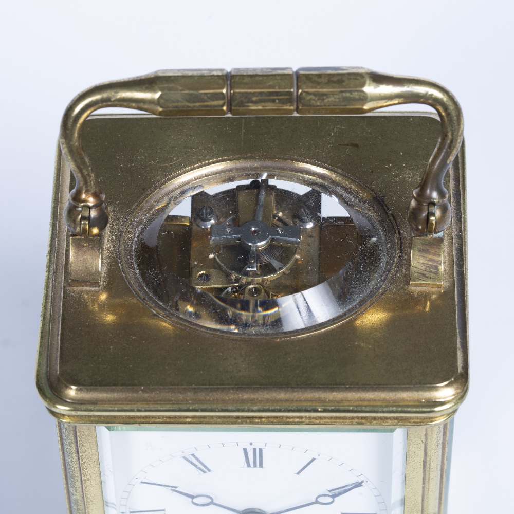 Brass cased carriage clock with loop handle and Roman numerals, with key, 7cm wide x 7cm deep x 12cm - Image 2 of 2