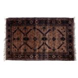 Afghan rust ground rug with panelled border 141cm x 90cm approx.