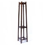 Stained mahogany hat and stick stand 174cm high