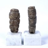 Two Maori carved stone figures each on later stand, 10cm and 9cm