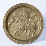 Bronze plate Iran, 19th/20th Century decorated to the centre depicting a figure on horseback